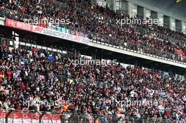 Fans in the grandstand. 13.04.2019. Formula 1 World Championship, Rd 3, Chinese Grand Prix, Shanghai, China, Qualifying Day.