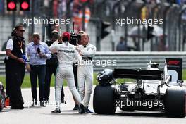 Valtteri Bottas (FIN) Mercedes AMG F1 celebrates his pole position in qualifying parc ferme with Lewis Hamilton (GBR) Mercedes AMG F1. 13.04.2019. Formula 1 World Championship, Rd 3, Chinese Grand Prix, Shanghai, China, Qualifying Day.