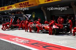 (L to R): Sebastian Vettel (GER) Ferrari SF90 and Charles Leclerc (MON) Ferrari SF90 in the pits. 13.04.2019. Formula 1 World Championship, Rd 3, Chinese Grand Prix, Shanghai, China, Qualifying Day.