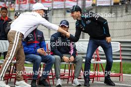 (L to R): Valtteri Bottas (FIN) Mercedes AMG F1 and Robert Kubica (POL) Williams Racing on the drivers parade. 14.04.2019. Formula 1 World Championship, Rd 3, Chinese Grand Prix, Shanghai, China, Race Day.