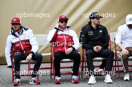 1000th F1 race photograph - (L to R): Antonio Giovinazzi (ITA) Alfa Romeo Racing; Kimi Raikkonen (FIN) Alfa Romeo Racing; Romain Grosjean (FRA) Haas F1 Team. 14.04.2019. Formula 1 World Championship, Rd 3, Chinese Grand Prix, Shanghai, China, Race Day.