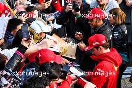 Lewis Hamilton (GBR) Mercedes AMG F1 and Charles Leclerc (MON) Ferrari sign autographs for the fans. 11.04.2019. Formula 1 World Championship, Rd 3, Chinese Grand Prix, Shanghai, China, Preparation Day.