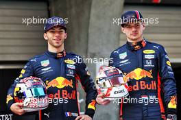 (L to R): Pierre Gasly (FRA) Red Bull Racing and Max Verstappen (NLD) Red Bull Racing celebrate 1000 F1 races with Esso and Mobil.  11.04.2019. Formula 1 World Championship, Rd 3, Chinese Grand Prix, Shanghai, China, Preparation Day.