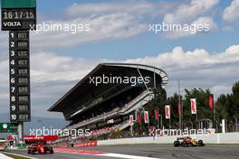 (L to R): Charles Leclerc (MON) Ferrari SF90 and Lando Norris (GBR) McLaren MCL34. 10.05.2019. Formula 1 World Championship, Rd 5, Spanish Grand Prix, Barcelona, Spain, Practice Day.