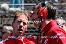 Sebastian Vettel (GER) Ferrari with Riccardo Adami (ITA) Ferrari Race Engineer on the grid. 12.05.2019. Formula 1 World Championship, Rd 5, Spanish Grand Prix, Barcelona, Spain, Race Day.