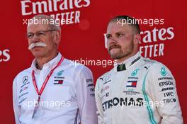 (L to R): Dr. Dieter Zetsche (GER) Daimler AG CEO and Valtteri Bottas (FIN) Mercedes AMG F1 on the podium. 12.05.2019. Formula 1 World Championship, Rd 5, Spanish Grand Prix, Barcelona, Spain, Race Day.