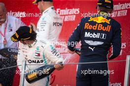 Race winner Lewis Hamilton (GBR) Mercedes AMG F1 celebrates on the podium with third placed Max Verstappen (NLD) Red Bull Racing. 12.05.2019. Formula 1 World Championship, Rd 5, Spanish Grand Prix, Barcelona, Spain, Race Day.