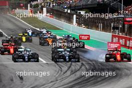 (L to R): Lewis Hamilton (GBR) Mercedes AMG F1 W10, Valtteri Bottas (FIN) Mercedes AMG F1 W10 and Sebastian Vettel (GER) Ferrari SF90 at the start of the race. 12.05.2019. Formula 1 World Championship, Rd 5, Spanish Grand Prix, Barcelona, Spain, Race Day.