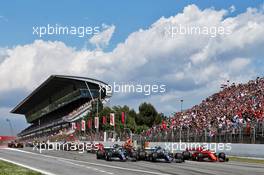 (L to R): Lewis Hamilton (GBR) Mercedes AMG F1 W10, Valtteri Bottas (FIN) Mercedes AMG F1 W10, and Sebastian Vettel (GER) Ferrari SF90, at the start of the race. 12.05.2019. Formula 1 World Championship, Rd 5, Spanish Grand Prix, Barcelona, Spain, Race Day.