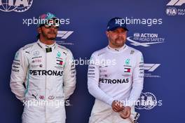 (L to R): second placed Lewis Hamilton (GBR) Mercedes AMG F1 with pole sitter and team mate Valtteri Bottas (FIN) Mercedes AMG F1 in qualifying parc ferme. 11.05.2019. Formula 1 World Championship, Rd 5, Spanish Grand Prix, Barcelona, Spain, Qualifying Day.