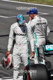 (L to R): Lewis Hamilton (GBR) Mercedes AMG F1 in qualifying parc ferme with team mate and pole sitter Valtteri Bottas (FIN) Mercedes AMG F1. 11.05.2019. Formula 1 World Championship, Rd 5, Spanish Grand Prix, Barcelona, Spain, Qualifying Day.