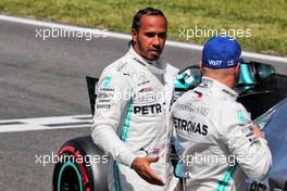 Lewis Hamilton (GBR) Mercedes AMG F1 in qualifying parc ferme with team mate and pole sitter Valtteri Bottas (FIN) Mercedes AMG F1. 11.05.2019. Formula 1 World Championship, Rd 5, Spanish Grand Prix, Barcelona, Spain, Qualifying Day.
