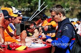 Daniil Kvyat (RUS) Scuderia Toro Rosso signs autographs for the fans. 12.05.2019. Formula 1 World Championship, Rd 5, Spanish Grand Prix, Barcelona, Spain, Race Day.