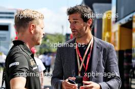 (L to R): Kevin Magnussen (DEN) Haas F1 Team with Mark Webber (AUS) Channel 4 Presenter. 12.05.2019. Formula 1 World Championship, Rd 5, Spanish Grand Prix, Barcelona, Spain, Race Day.