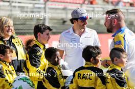 Carlos Sainz Jr (ESP) McLaren with young karters. 09.05.2019. Formula 1 World Championship, Rd 5, Spanish Grand Prix, Barcelona, Spain, Preparation Day.