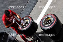 Ferrari mechanic working behind trucks in the paddock. 09.05.2019. Formula 1 World Championship, Rd 5, Spanish Grand Prix, Barcelona, Spain, Preparation Day.