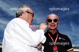 (L to R): Jerome Stoll (FRA) Renault Sport F1 President with Thierry Bollore (FRA) Renault Chief Competitive Officer on the grid. 23.06.2019. Formula 1 World Championship, Rd 8, French Grand Prix, Paul Ricard, France, Race Day.