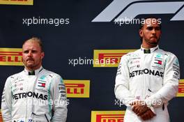 (L to R): second placed Valtteri Bottas (FIN) Mercedes AMG F1 on the podium with race winner Lewis Hamilton (GBR) Mercedes AMG F1. 23.06.2019. Formula 1 World Championship, Rd 8, French Grand Prix, Paul Ricard, France, Race Day.