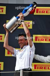 Nathan Divey (GBR) Mercedes AMG F1 No1 Mechanic celebrates on the podium. 23.06.2019. Formula 1 World Championship, Rd 8, French Grand Prix, Paul Ricard, France, Race Day.
