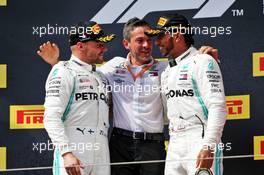 The podium (L to R): second placed Valtteri Bottas (FIN) Mercedes AMG F1 celebrates with Nathan Divey (GBR) Mercedes AMG F1 No1 Mechanic and race winner Lewis Hamilton (GBR) Mercedes AMG F1. 23.06.2019. Formula 1 World Championship, Rd 8, French Grand Prix, Paul Ricard, France, Race Day.