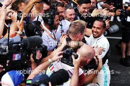 Race winner Lewis Hamilton (GBR) Mercedes AMG F1 celebrates with the team in parc ferme. 23.06.2019. Formula 1 World Championship, Rd 8, French Grand Prix, Paul Ricard, France, Race Day.