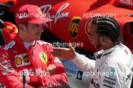 (L to R): Charles Leclerc (MON) Ferrari with pole sitter Lewis Hamilton (GBR) Mercedes AMG F1 in qualifying parc ferme. 22.06.2019. Formula 1 World Championship, Rd 8, French Grand Prix, Paul Ricard, France, Qualifying Day.