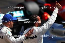 Lewis Hamilton (GBR) Mercedes AMG F1 celebrates his pole position in qualifying parc ferme (Right) with second placed team mate Valtteri Bottas (FIN) Mercedes AMG F1. 22.06.2019. Formula 1 World Championship, Rd 8, French Grand Prix, Paul Ricard, France, Qualifying Day.