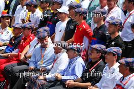 Drivers, team personnel, Chase Carey (USA) Formula One Group Chairman, and Jean Todt (FRA) FIA President, celebrate the 80th birthday of Jackie Stewart (GBR). 23.06.2019. Formula 1 World Championship, Rd 8, French Grand Prix, Paul Ricard, France, Race Day.