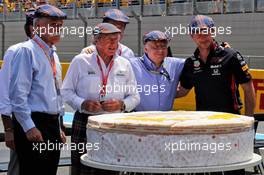 (L to R): Chase Carey (USA) Formula One Group Chairman with Jackie Stewart (GBR), celebrating his 80th birthday; Jean Todt (FRA) FIA President; and Christian Horner (GBR) Red Bull Racing Team Principal. 23.06.2019. Formula 1 World Championship, Rd 8, French Grand Prix, Paul Ricard, France, Race Day.