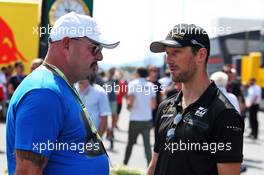 (L to R): Philippe Bianchi with Romain Grosjean (FRA) Haas F1 Team. 23.06.2019. Formula 1 World Championship, Rd 8, French Grand Prix, Paul Ricard, France, Race Day.