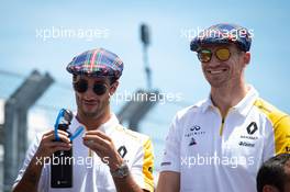 (L to R): Daniel Ricciardo (AUS) Renault F1 Team and Nico Hulkenberg (GER) Renault F1 Team celebrate the 80th birthday of Jackie Stewart (GBR). 23.06.2019. Formula 1 World Championship, Rd 8, French Grand Prix, Paul Ricard, France, Race Day.