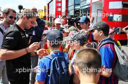 Romain Grosjean (FRA) Haas F1 Team signs autographs for the fans. 20.06.2019. Formula 1 World Championship, Rd 8, French Grand Prix, Paul Ricard, France, Preparation Day.