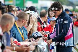 Lance Stroll (CDN) Racing Point F1 Team signs autographs for the fans. 12.07.2019. Formula 1 World Championship, Rd 10, British Grand Prix, Silverstone, England, Practice Day.