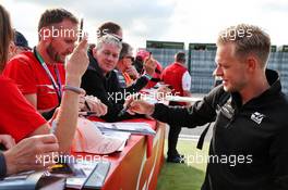 Kevin Magnussen (DEN) Haas F1 Team signs autographs for the fans. 12.07.2019. Formula 1 World Championship, Rd 10, British Grand Prix, Silverstone, England, Practice Day.