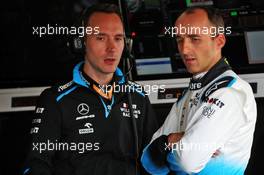 Robert Kubica (POL) Williams Racing with Paul Williams (GBR) Williams Racing Race Engineer. 12.07.2019. Formula 1 World Championship, Rd 10, British Grand Prix, Silverstone, England, Practice Day.