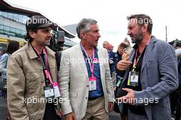 (L to R): Dynamo (GBR) Magician with Steve Coogan (GBR) Comedian and Lee Mack (GBR) Comedian. 14.07.2019. Formula 1 World Championship, Rd 10, British Grand Prix, Silverstone, England, Race Day.