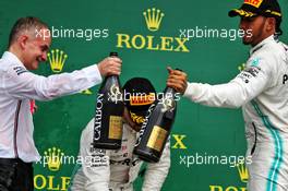 Race winner Lewis Hamilton (GBR) Mercedes AMG F1 celebrates on the podium. 14.07.2019. Formula 1 World Championship, Rd 10, British Grand Prix, Silverstone, England, Race Day.