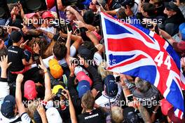 Race winner Lewis Hamilton (GBR) Mercedes AMG F1 celebrates with the fans at the end of the race. 14.07.2019. Formula 1 World Championship, Rd 10, British Grand Prix, Silverstone, England, Race Day.