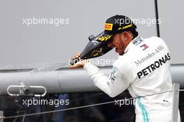 Race winner Lewis Hamilton (GBR) Mercedes AMG F1 celebrates on the podium. 14.07.2019. Formula 1 World Championship, Rd 10, British Grand Prix, Silverstone, England, Race Day.