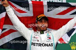 Race winner Lewis Hamilton (GBR) Mercedes AMG F1 celebrates on the podium. 14.07.2019. Formula 1 World Championship, Rd 10, British Grand Prix, Silverstone, England, Race Day.