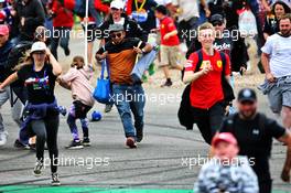 Fans invade the circuit at the end of the race. 14.07.2019. Formula 1 World Championship, Rd 10, British Grand Prix, Silverstone, England, Race Day.
