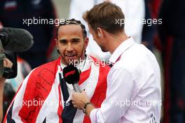 Race winner Lewis Hamilton (GBR) Mercedes AMG F1 with Jenson Button (GBR) Sky Sports F1 Presenter in parc ferme. 14.07.2019. Formula 1 World Championship, Rd 10, British Grand Prix, Silverstone, England, Race Day.