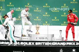 1st place Lewis Hamilton (GBR) Mercedes AMG F1 W10 with Valtteri Bottas (FIN) Mercedes AMG F1 W10 and Charles Leclerc (MON) Ferrari SF90. 14.07.2019. Formula 1 World Championship, Rd 10, British Grand Prix, Silverstone, England, Race Day.