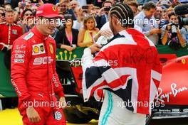 Race winner Lewis Hamilton (GBR) Mercedes AMG F1 celebrates with Charles Leclerc (MON) Ferrari in parc ferme. 14.07.2019. Formula 1 World Championship, Rd 10, British Grand Prix, Silverstone, England, Race Day.
