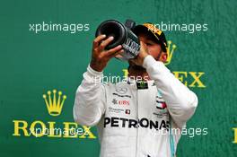 Race winner Lewis Hamilton (GBR) Mercedes AMG F1 celebrates on the podium. 14.07.2019. Formula 1 World Championship, Rd 10, British Grand Prix, Silverstone, England, Race Day.