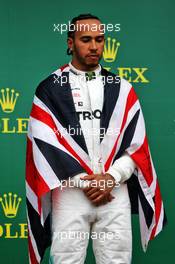 Race winner Lewis Hamilton (GBR) Mercedes AMG F1 celebrates on the podium. 14.07.2019. Formula 1 World Championship, Rd 10, British Grand Prix, Silverstone, England, Race Day.