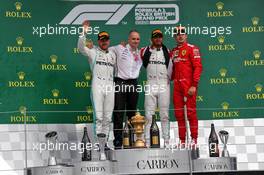 The podium (L to R): Valtteri Bottas (FIN) Mercedes AMG F1, second; Lewis Hamilton (GBR) Mercedes AMG F1, race winner; Charles Leclerc (MON) Ferrari, third. 14.07.2019. Formula 1 World Championship, Rd 10, British Grand Prix, Silverstone, England, Race Day.