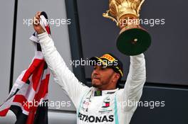 Race winner Lewis Hamilton (GBR) Mercedes AMG F1 celebrates on the podium. 14.07.2019. Formula 1 World Championship, Rd 10, British Grand Prix, Silverstone, England, Race Day.