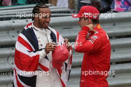 Lewis Hamilton (GBR) Mercedes AMG F1 W10 and Charles Leclerc (MON) Ferrari SF90. 14.07.2019. Formula 1 World Championship, Rd 10, British Grand Prix, Silverstone, England, Race Day.