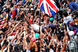 Race winner Lewis Hamilton (GBR) Mercedes AMG F1 celebrates with the fans at the end of the race. 14.07.2019. Formula 1 World Championship, Rd 10, British Grand Prix, Silverstone, England, Race Day.